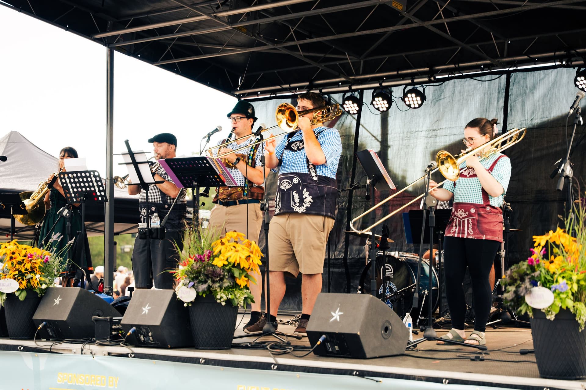 Oompah band performing on the main stage at Castle Rock Oktoberfest 2026