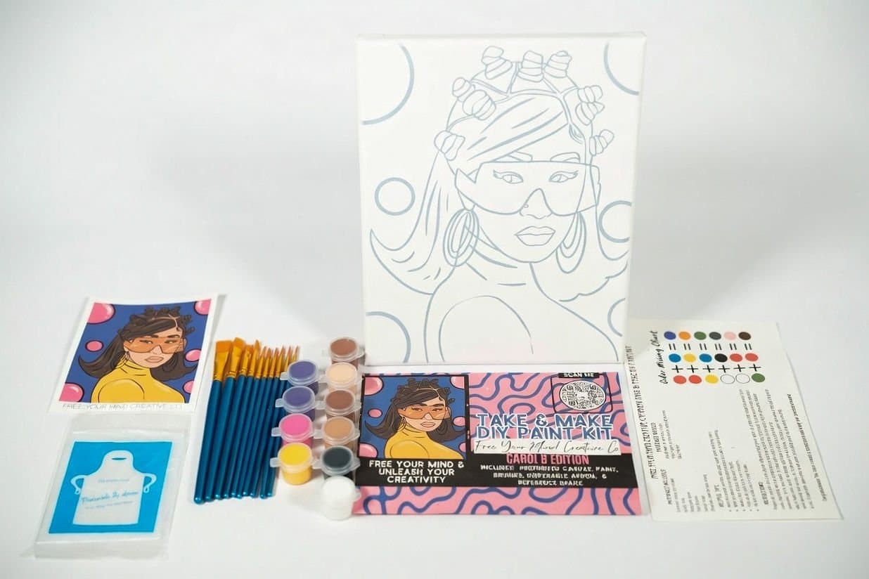 Paint-by-design canvas kit laid out with paints and brushes, Colorado product photographer