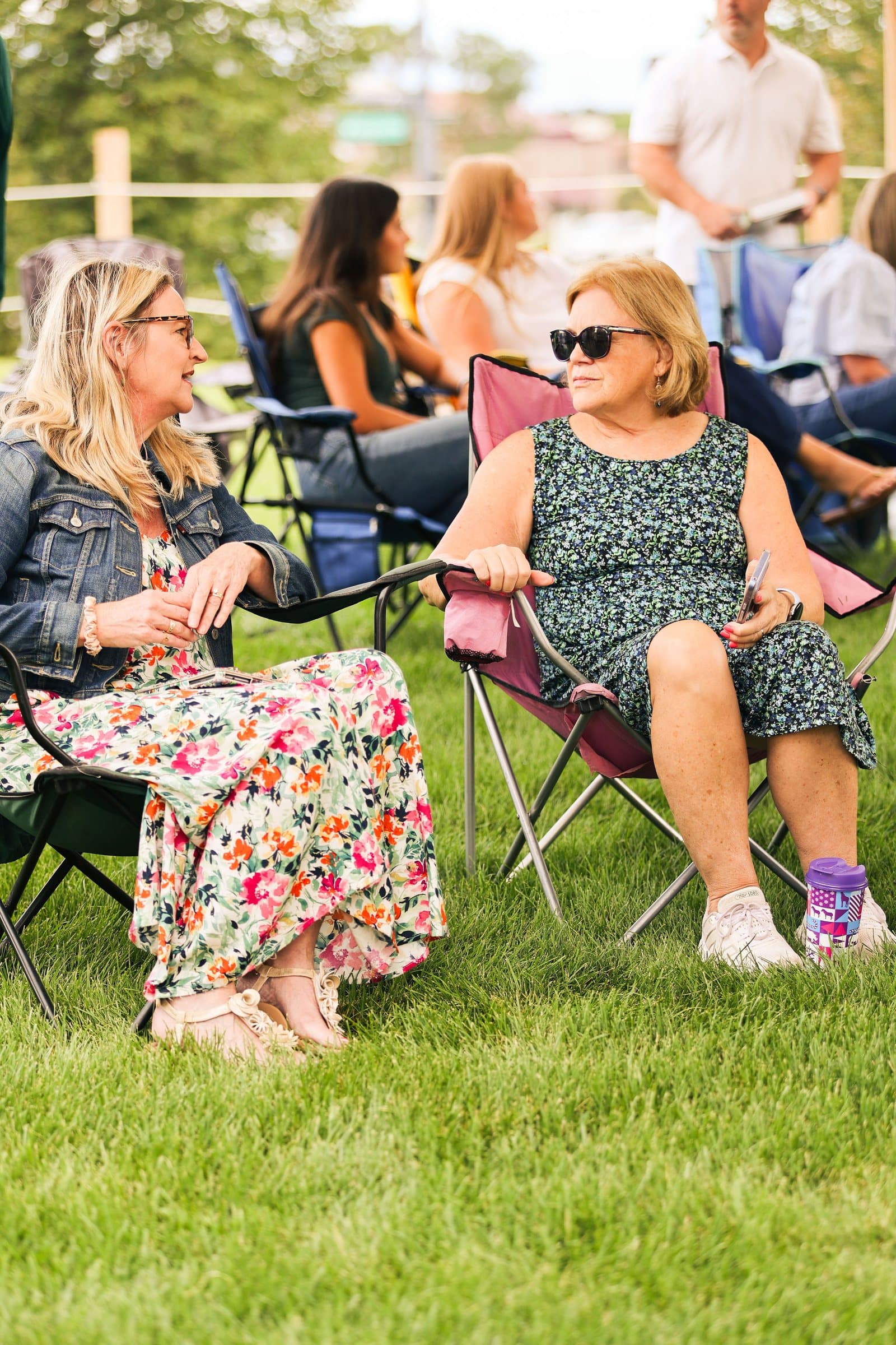 Congregation seated on the lawn during an outdoor church service in Colorado