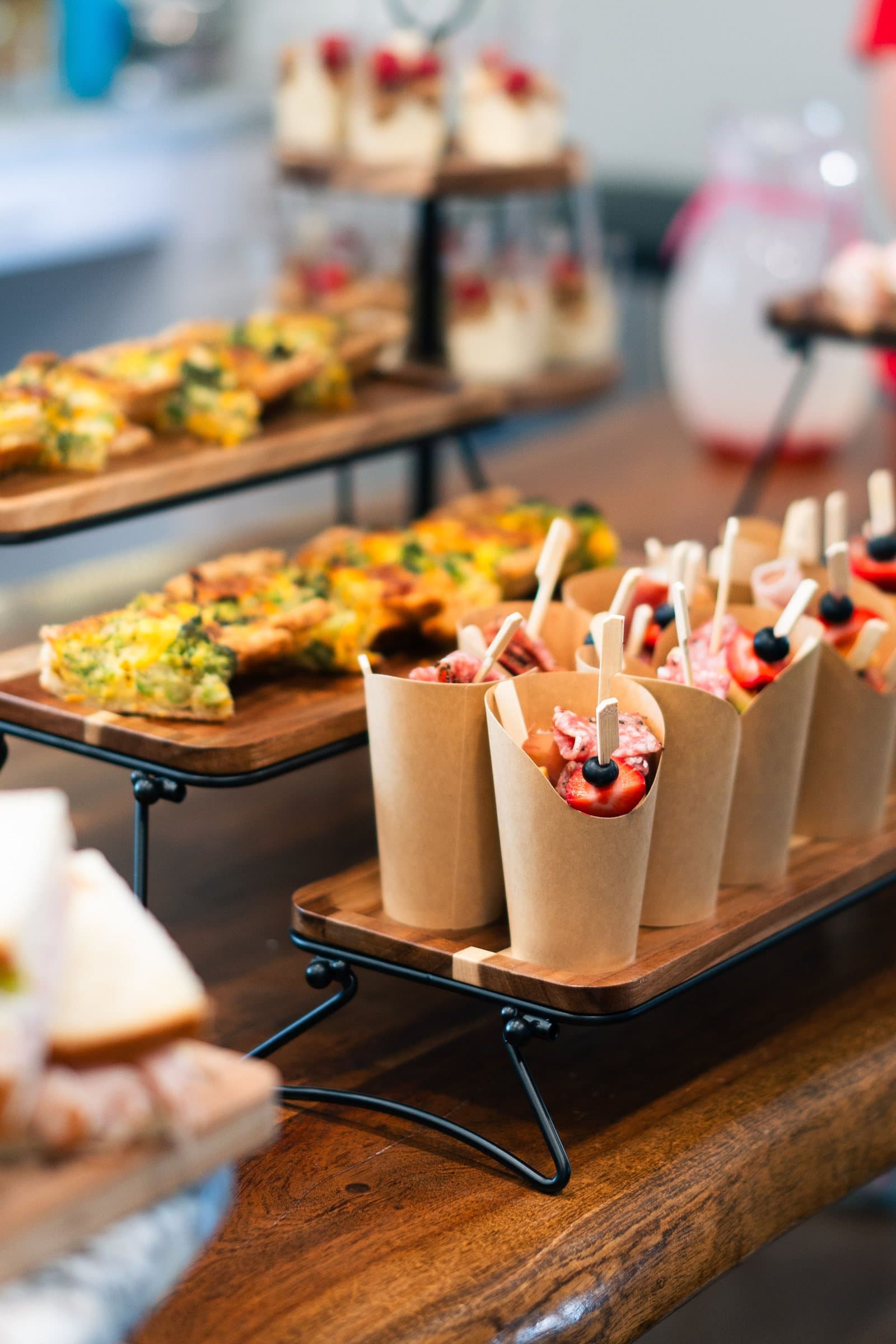 Tiered display of baby shower appetizers and desserts, Colorado food photography