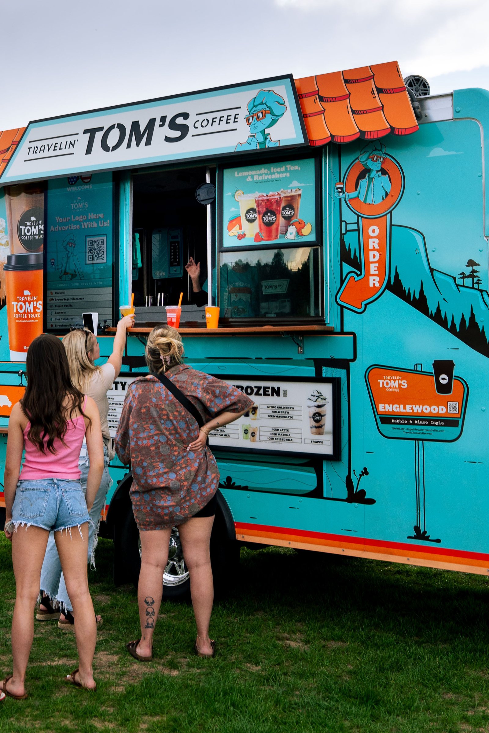 Guests ordering at Tom's food truck at Castle Pines Food Truck Frenzy 2026