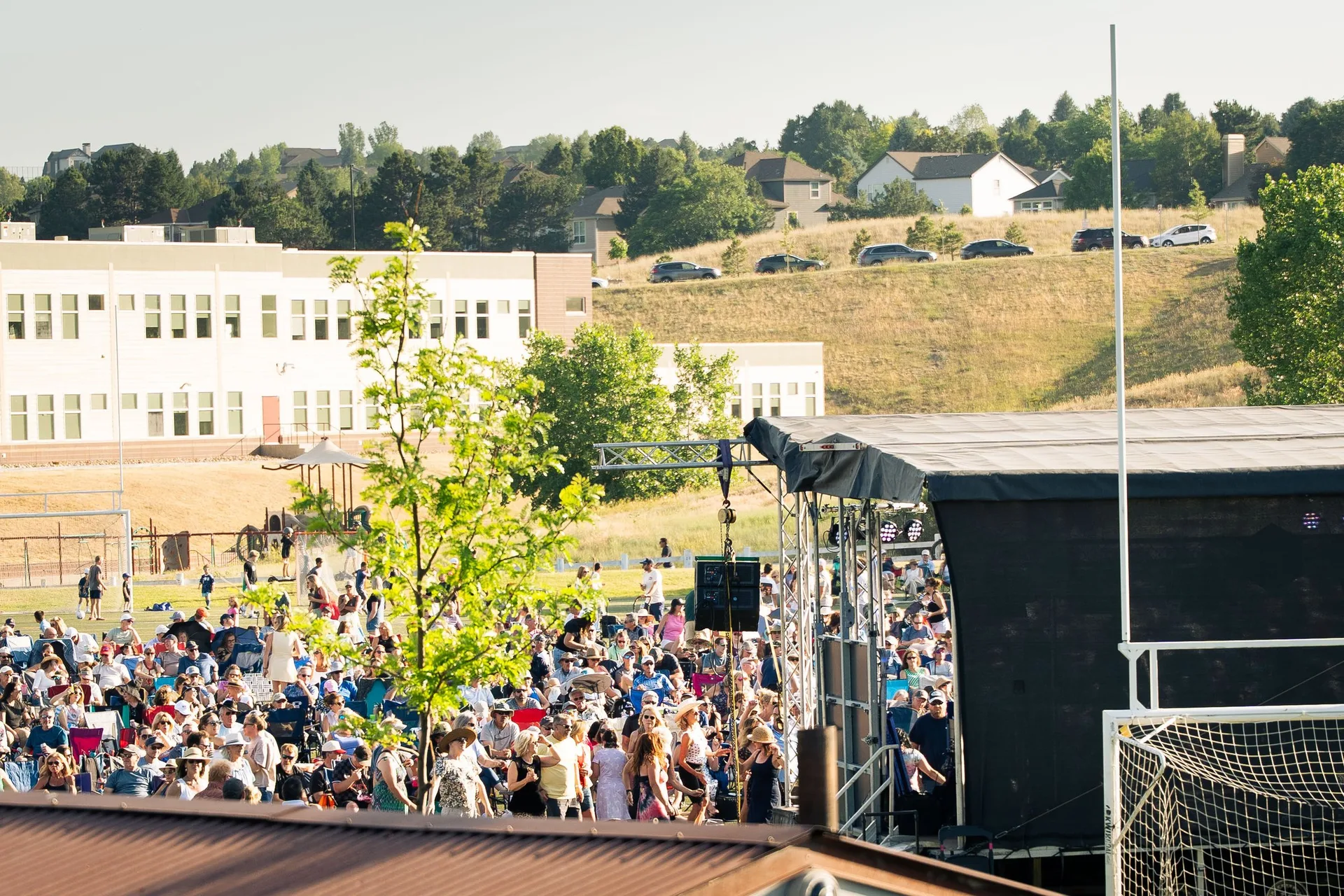 View over the packed Castle Pines concert crowd from beside the stage