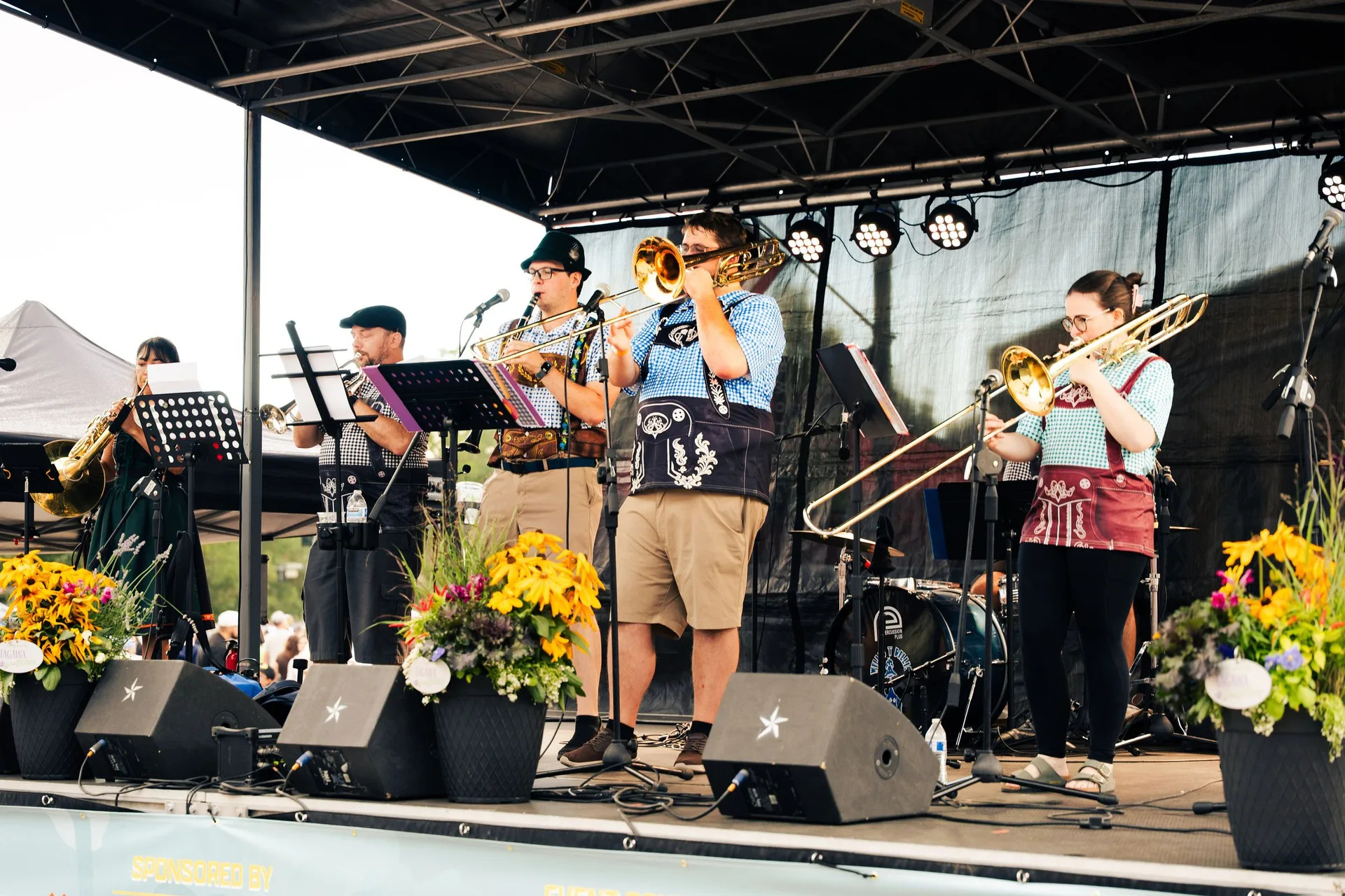 Oompah band performing on the main stage at Castle Rock Oktoberfest 2026