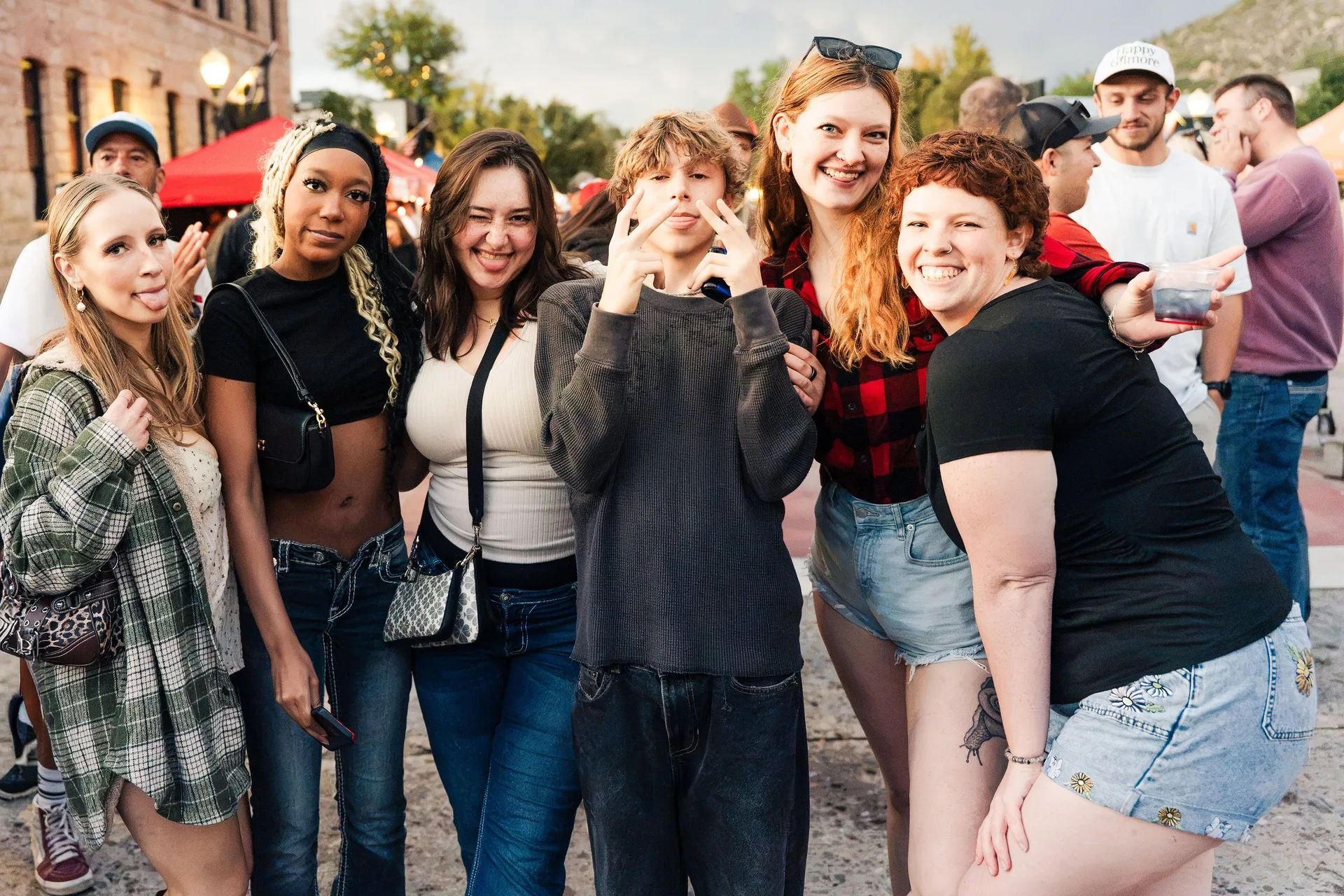 Group of friends dancing together at Castle Rock Oktoberfest 2026